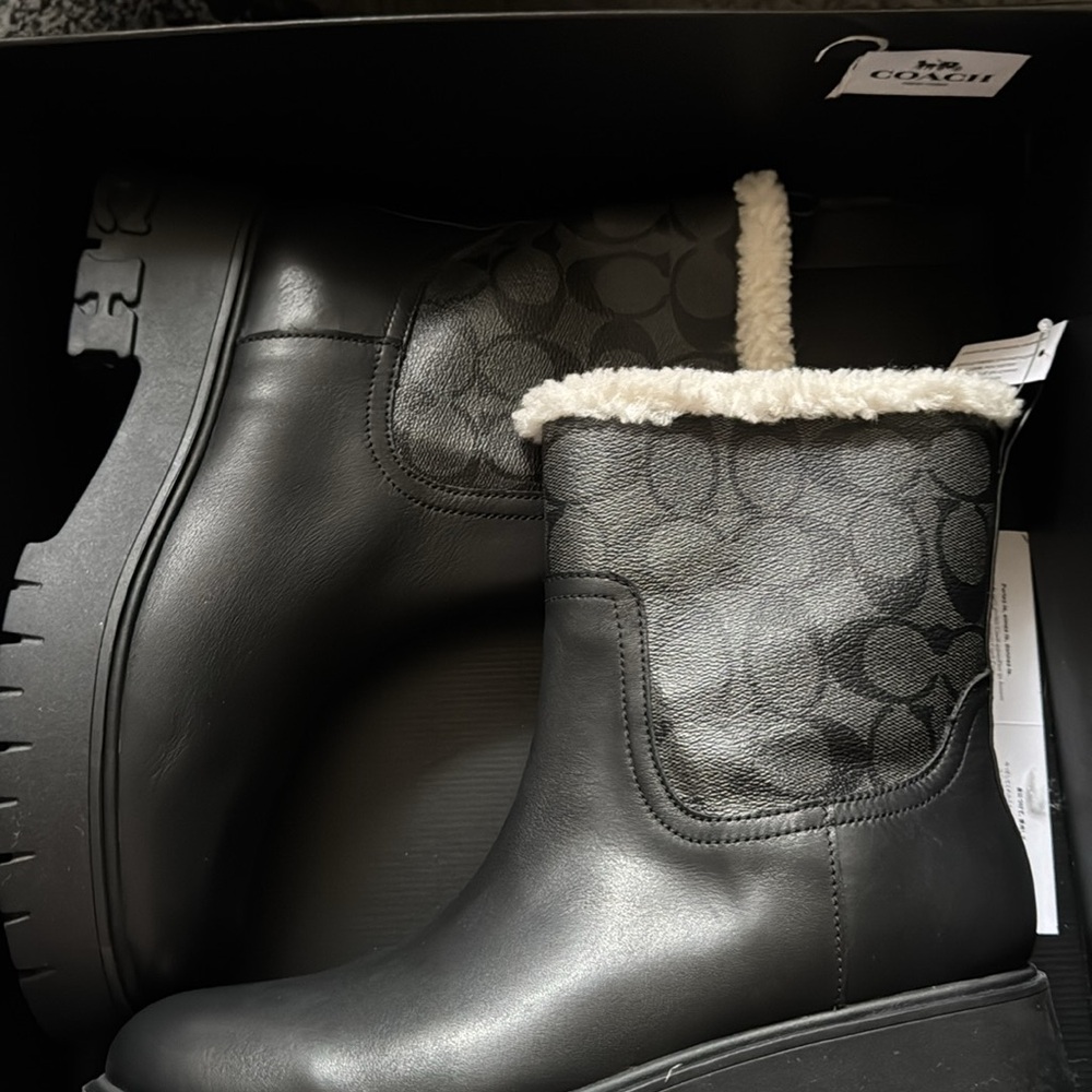 Coach winter boots Brand New with tags still in box . Raina Sig boot 7.5 size